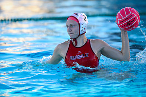 Kaitlyn Brown '23 readies to throw the ball during a water polo match between Carondelet and California on October 28, 2021.