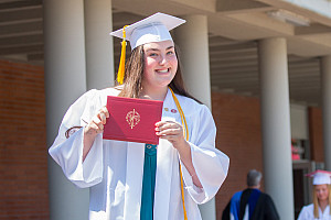 Caitlin Papalia poses with her diploma at Drive Through Graduation on August 1, 2020.