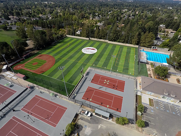 An overhead shot of the Carondelet Athletics Complex fields, courts, and pool