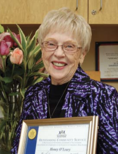Honey O'Leary holds Jefferson Award. She worked at Carondelet for almost 30 years as both a t...