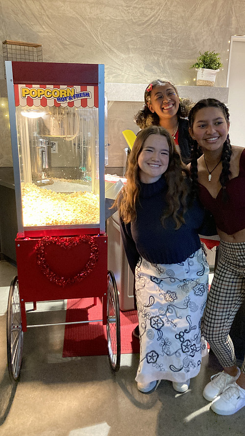 Student leaders, Olive Read ?25, Camille Conrad ?25, and Mariella Cajina ?24, dish ou...